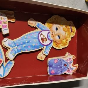 Bundle of wooden magnet dress up doll